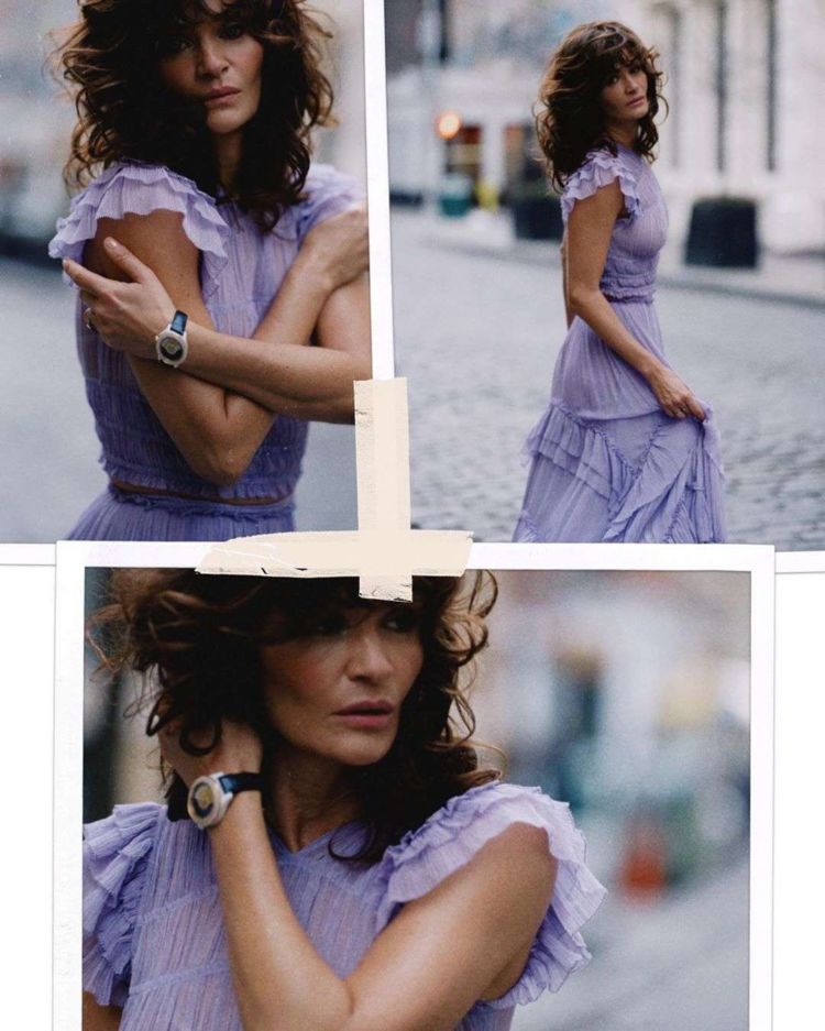 Helena Christensen Posing In A Purple Dress Out On The Street