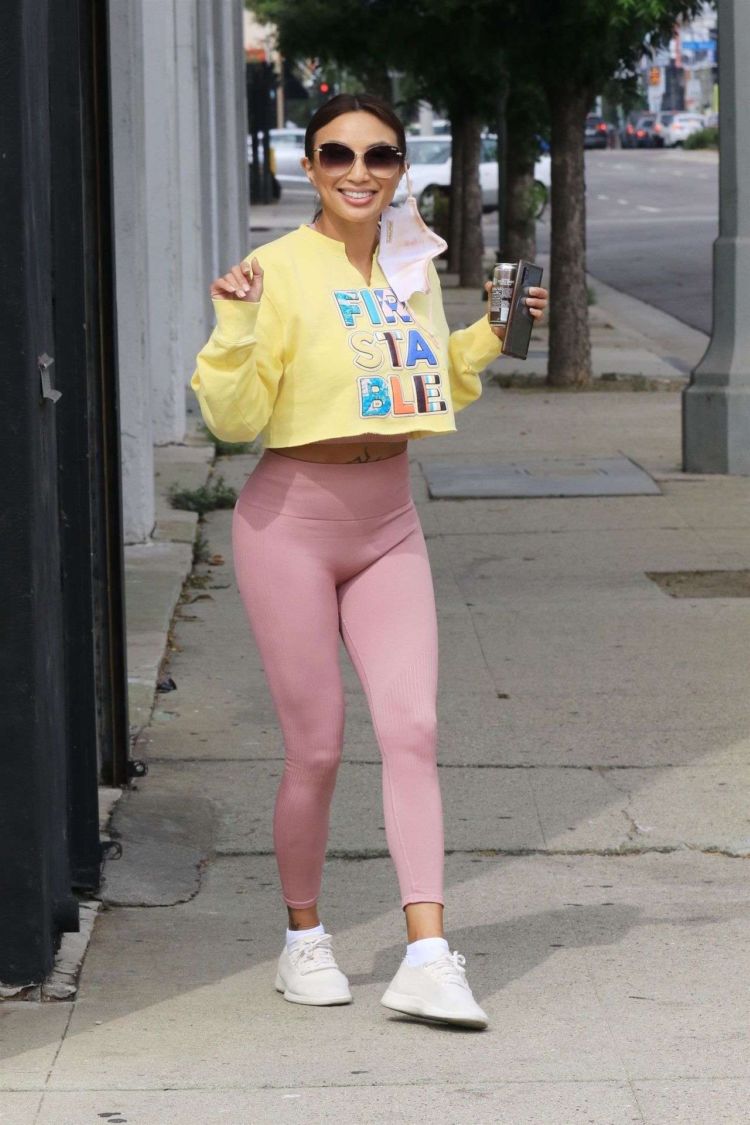 Jeannie Mai Smiles As She Arrives At The DWTS Studio
