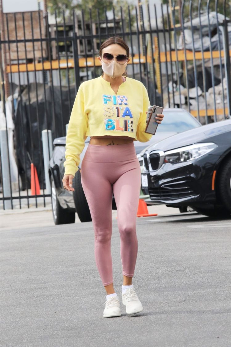 Jeannie Mai Smiles As She Arrives At The DWTS Studio