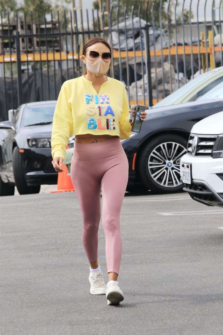 Jeannie Mai Smiles As She Arrives At The DWTS Studio