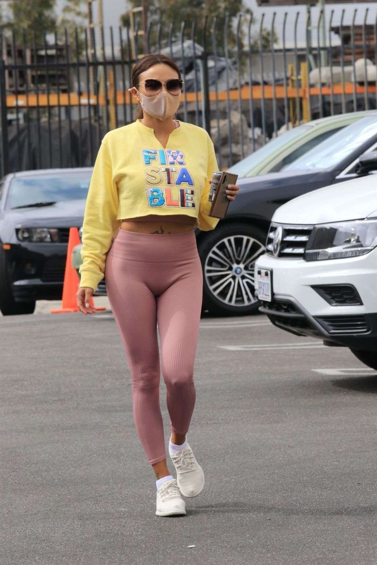 Jeannie Mai Smiles As She Arrives At The DWTS Studio