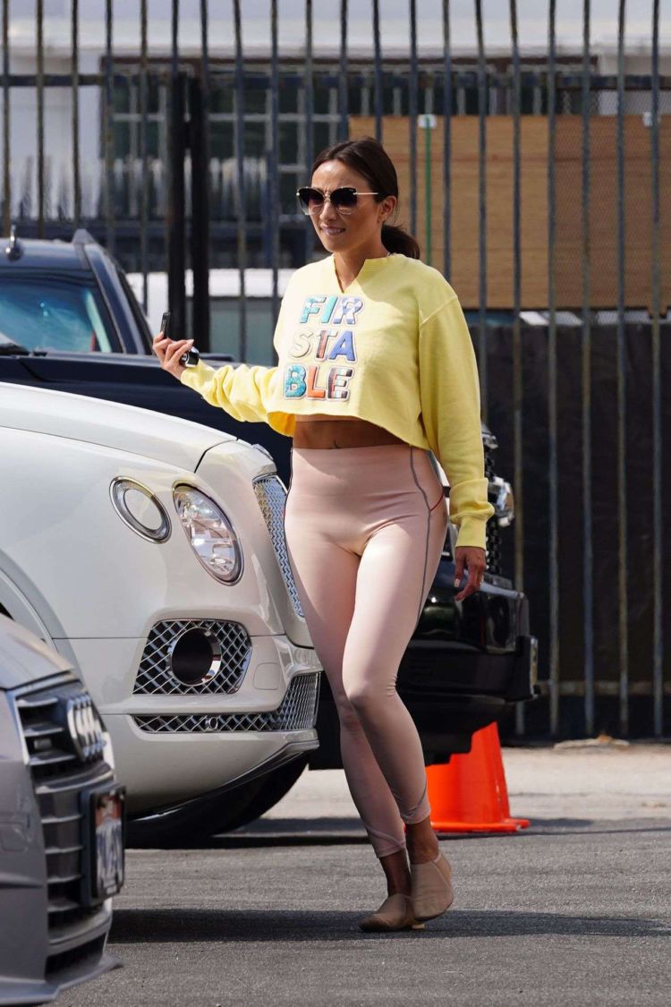 Jeannie Mai Smiles As She Arrives At The DWTS Studio