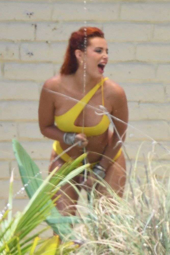 Bella Thorne Vacationing In A Yellow Bikini In Miami