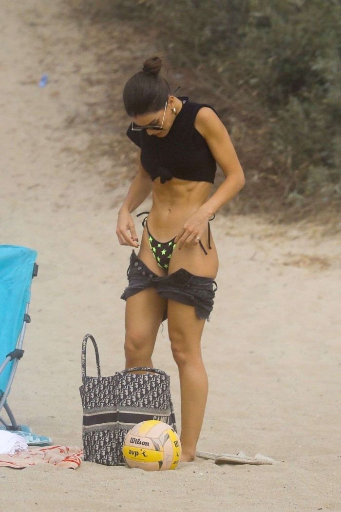Camila Coelho Vacationing In A Black And Green Bikini At The Beach