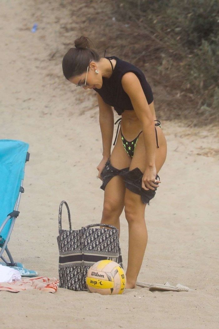 Camila Coelho Vacationing In A Black And Green Bikini At The Beach