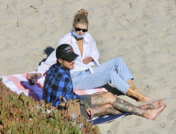 Charlotte McKinney In A Bikini Top And Blue Jeans At The Beach