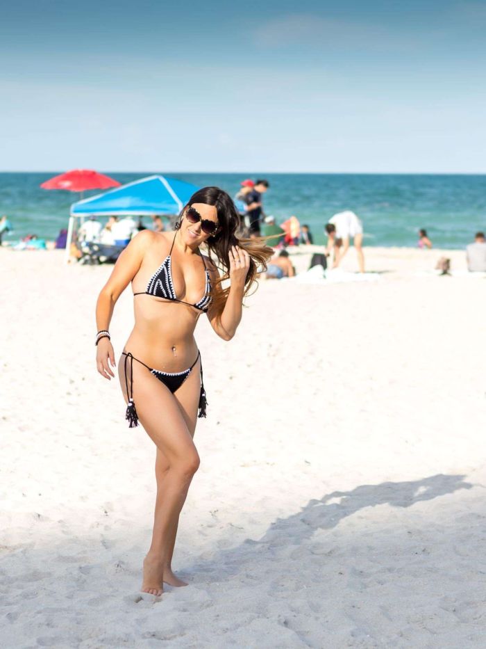 Claudia Romani Relaxing In Bikini On South Beach