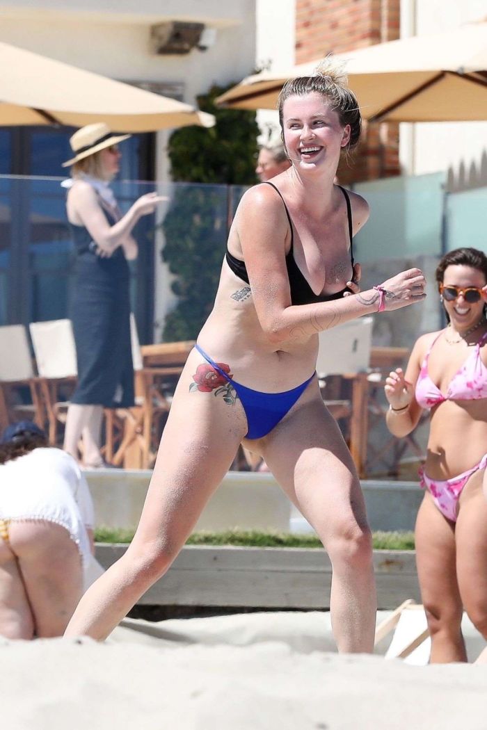 Ireland Baldwin Surfboarding In A Blue Bikini At The Beach In Malibu