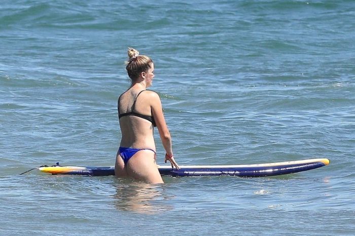 Ireland Baldwin Surfboarding In A Blue Bikini At The Beach In Malibu