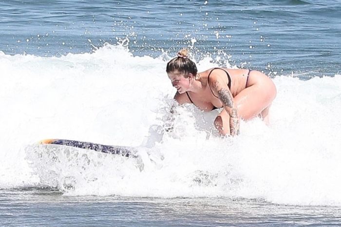 Ireland Baldwin Surfboarding In A Blue Bikini At The Beach In Malibu