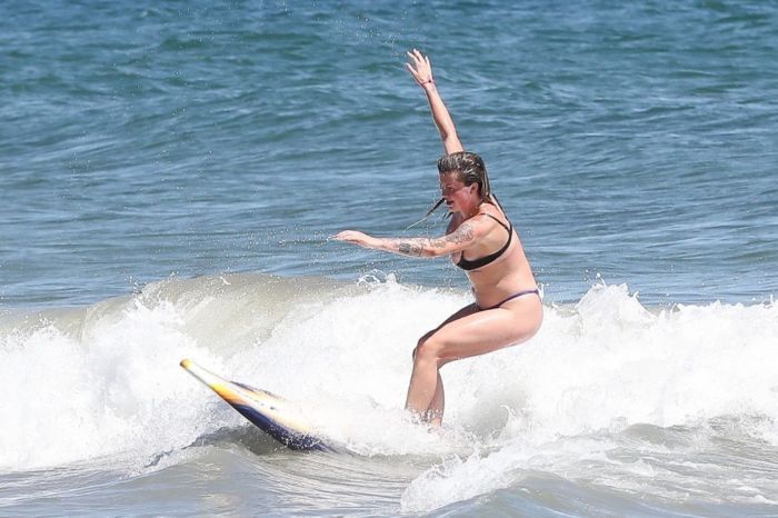 Ireland Baldwin Surfboarding In A Blue Bikini At The Beach In Malibu
