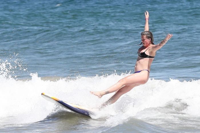 Ireland Baldwin Surfboarding In A Blue Bikini At The Beach In Malibu