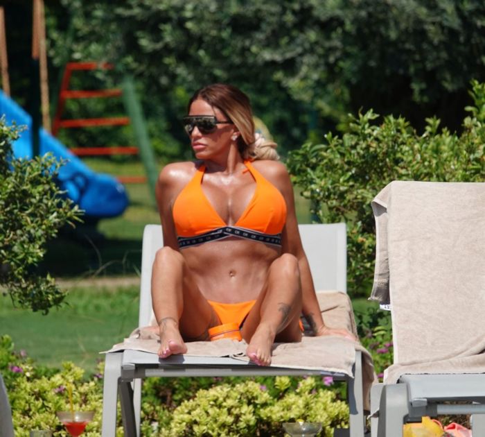 Katie Price In An Orange Bikini At A Swimming Pool In Turkey