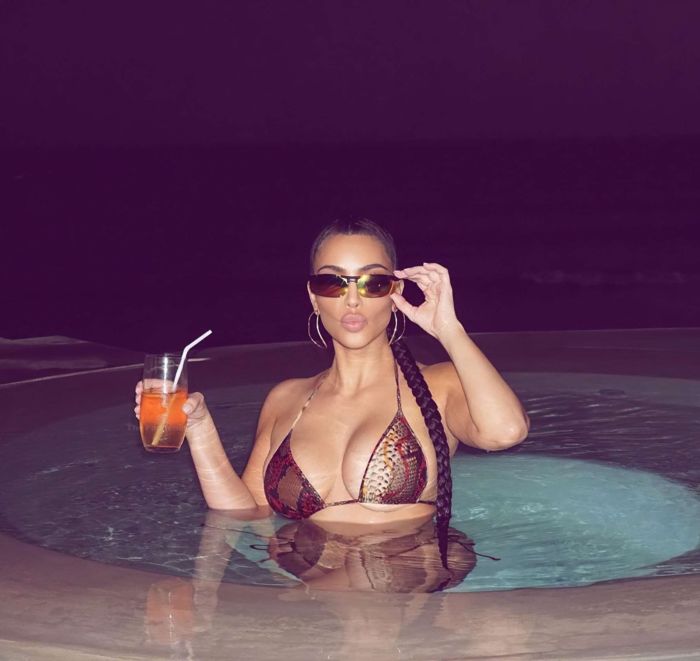 Kim Kardashian Relaxing In Bikini At The Pool