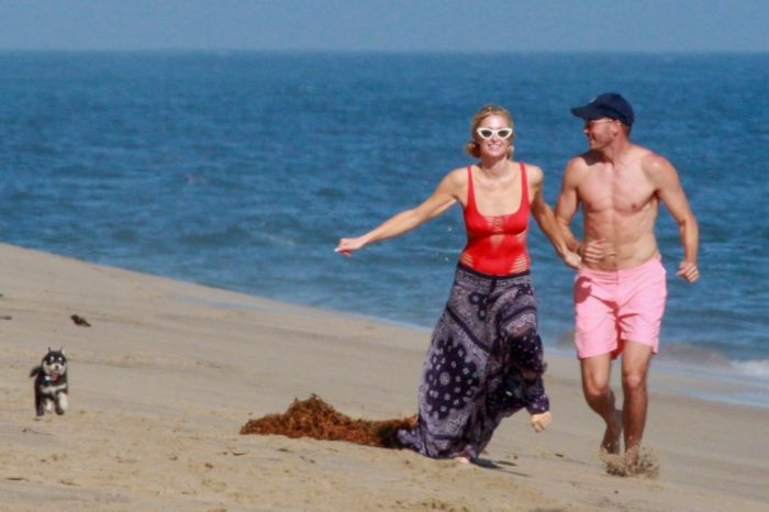 Paris Hilton Vacationing In A Red Swimsuit On The Beach In Malibu
