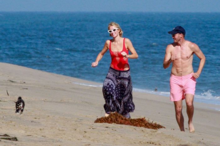 Paris Hilton Vacationing In A Red Swimsuit On The Beach In Malibu