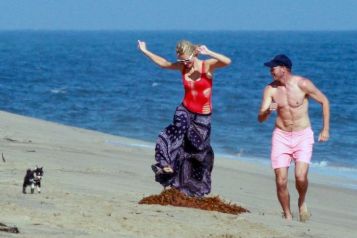Paris Hilton Vacationing In A Red Swimsuit On The Beach In Malibu