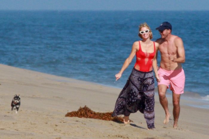 Paris Hilton Vacationing In A Red Swimsuit On The Beach In Malibu