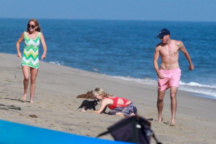 Paris Hilton Vacationing In A Red Swimsuit On The Beach In Malibu
