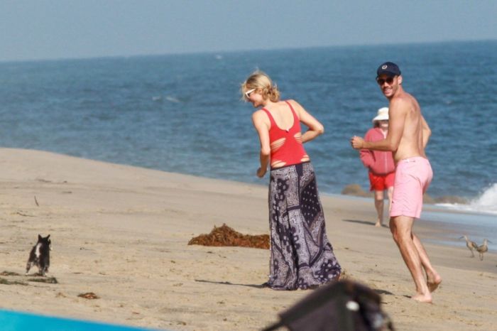 Paris Hilton Vacationing In A Red Swimsuit On The Beach In Malibu