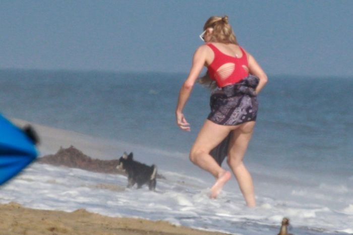 Paris Hilton Vacationing In A Red Swimsuit On The Beach In Malibu