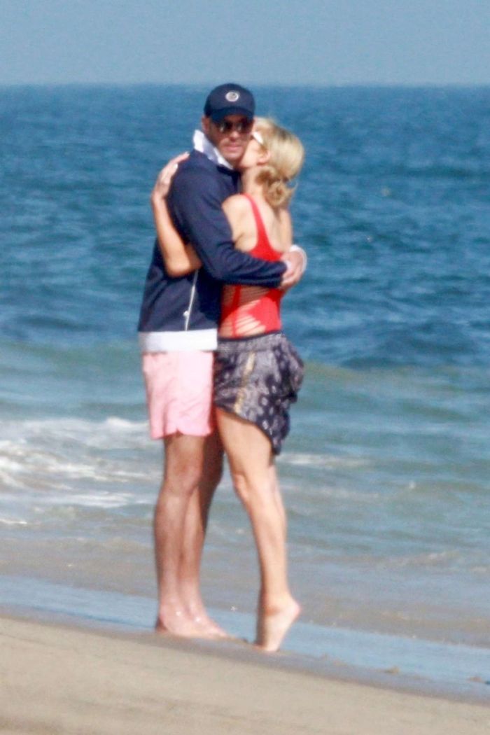 Paris Hilton Vacationing In A Red Swimsuit On The Beach In Malibu