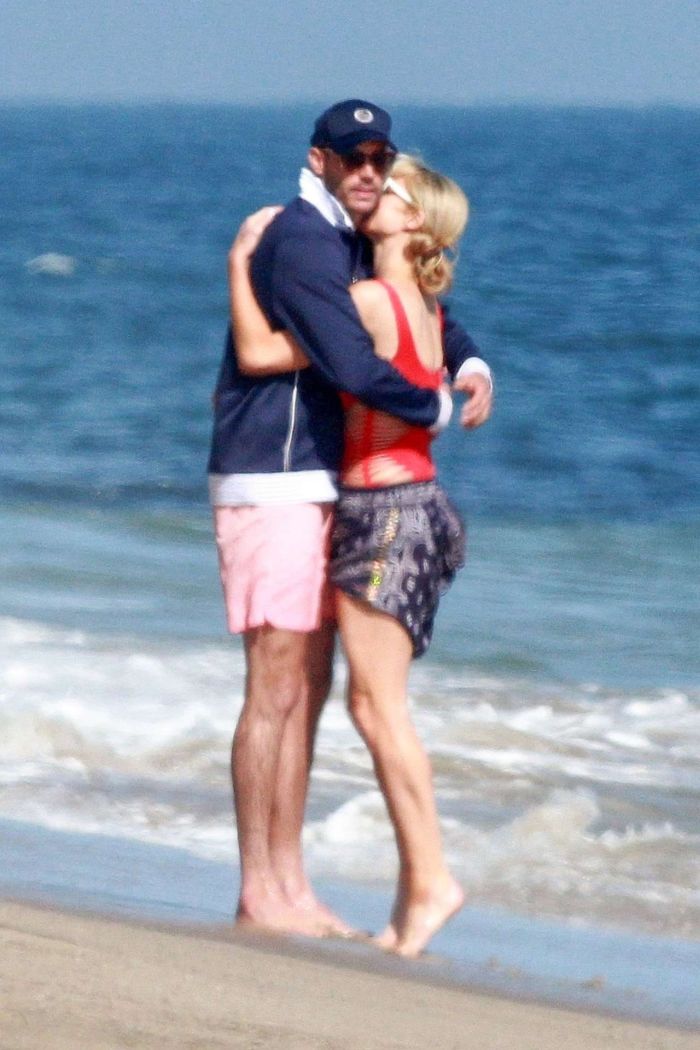 Paris Hilton Vacationing In A Red Swimsuit On The Beach In Malibu