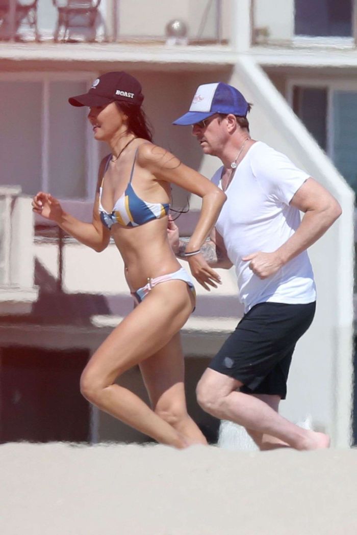Soo Yeon Lee And Dylan McDermott Playing Beach Games In Los Angeles