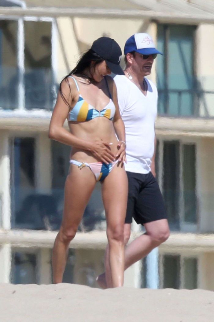 Soo Yeon Lee And Dylan McDermott Playing Beach Games In Los Angeles