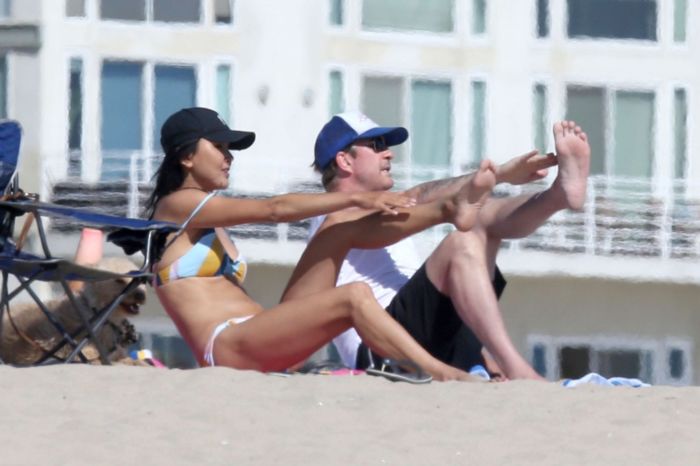 Soo Yeon Lee And Dylan McDermott Playing Beach Games In Los Angeles
