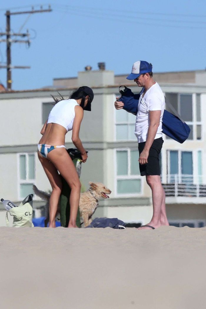 Soo Yeon Lee And Dylan McDermott Playing Beach Games In Los Angeles