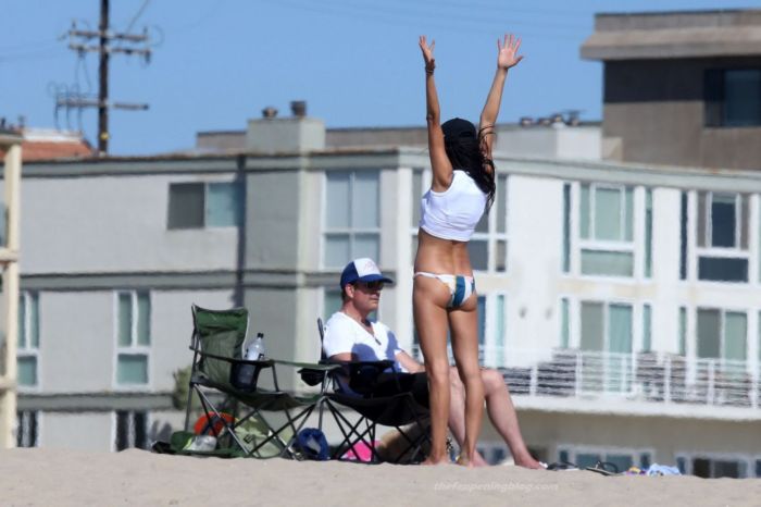Soo Yeon Lee And Dylan McDermott Playing Beach Games In Los Angeles