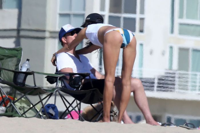 Soo Yeon Lee And Dylan McDermott Playing Beach Games In Los Angeles